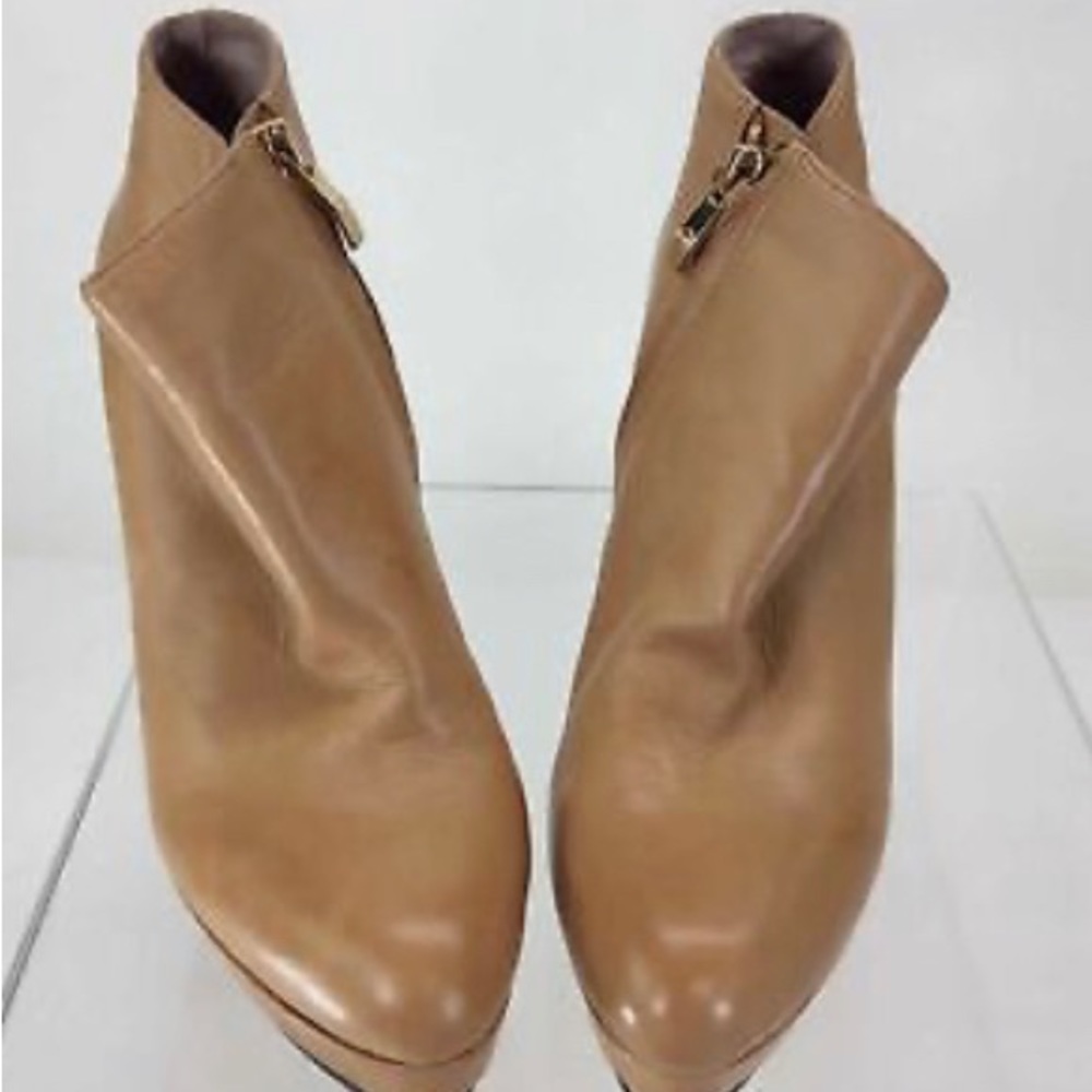 Vince Camuto. Leather  soft buff/ tan platform booties with gold accents.